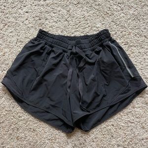 Black lulu lemon athletic shorts. Size 6. Worn with logo missing.